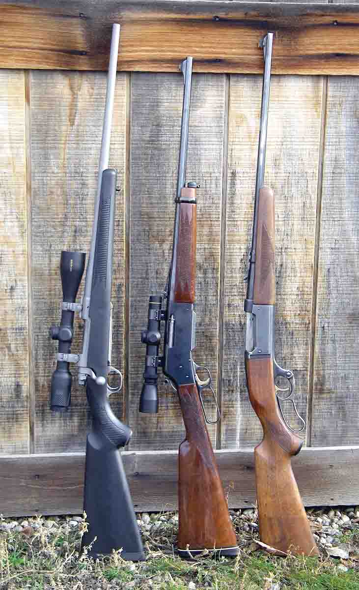 Bolt-action rifles often handle near maximum loads better than lever actions, such as the Browning BLR 81 and Savage Model 99 (center and right). Brian suggests carefully testing loads to be certain that they function properly in a specific rifle.